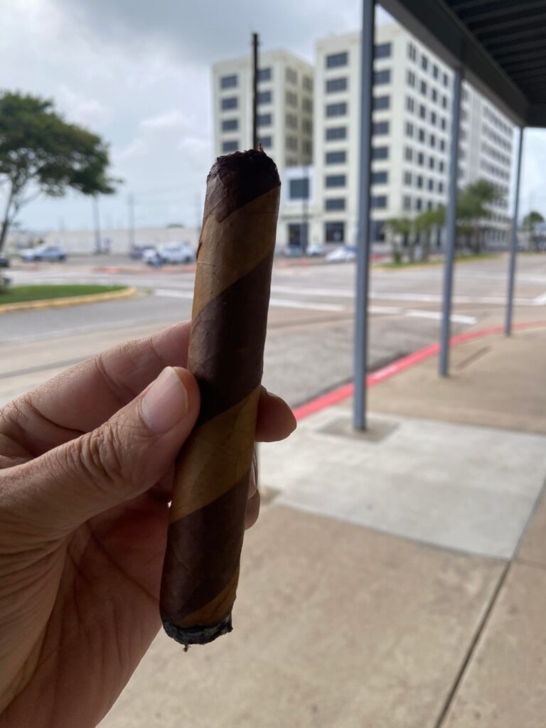 Barber pole cigar with dual-wrapped leaf, featured on Galveston's local cigar tour by Pubs N' Grubs