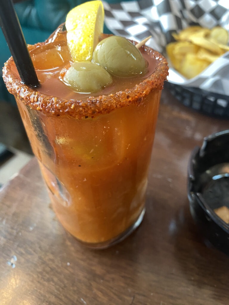 Spicy Bloody Mary served on Pubs N’ Grubs Galveston cigar sit down smoke experience with a hand-rolled local cigar and custom crafted to my heat level drink
