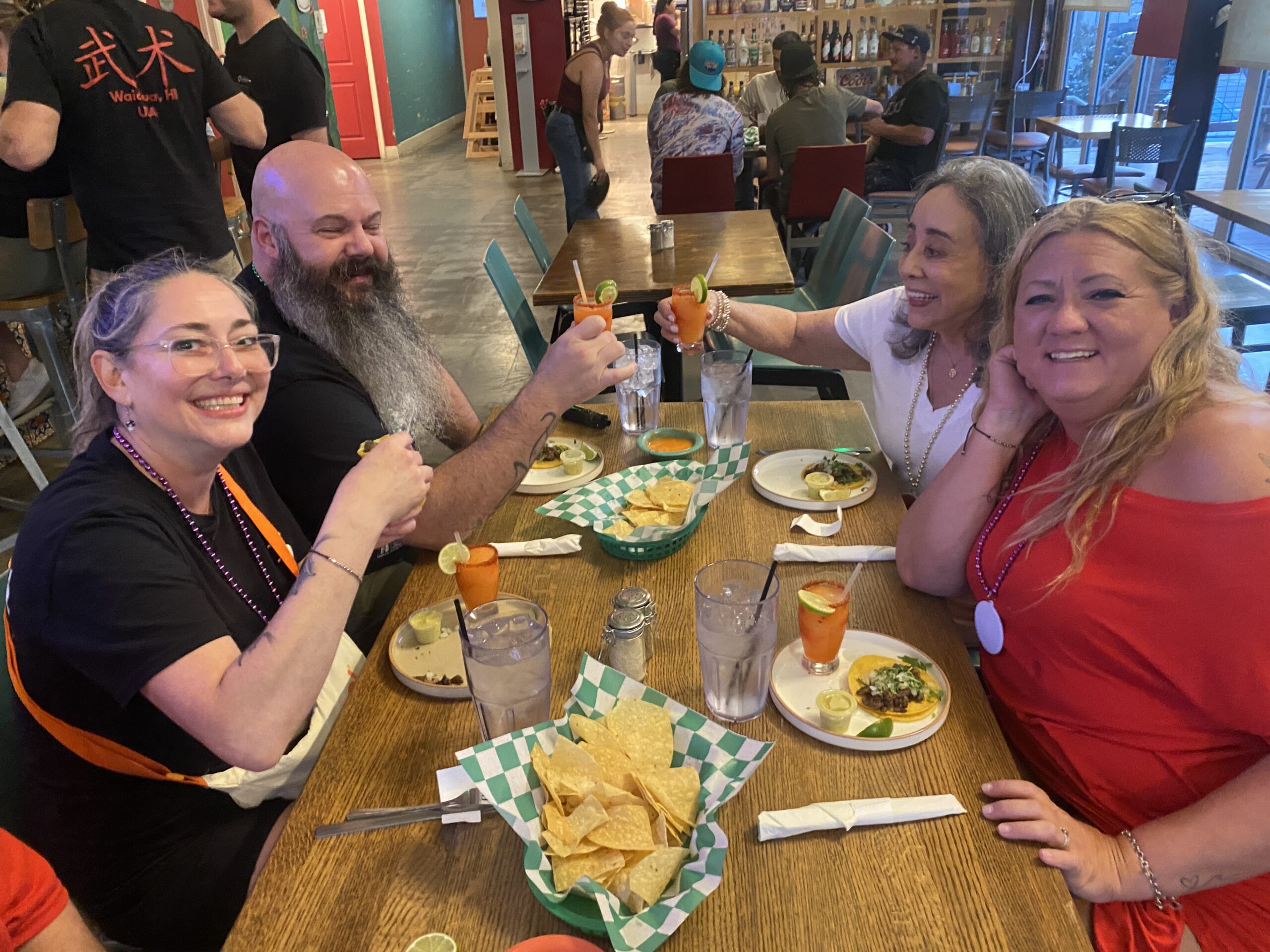 Tour group enjoying drinks at our second stop