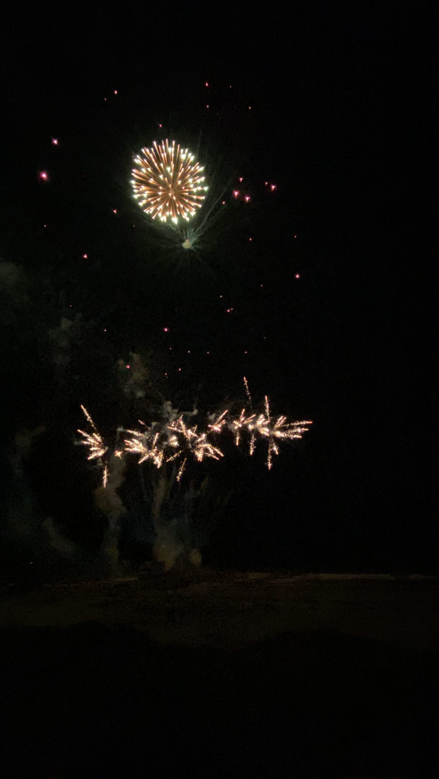 Independence Day fireworks above Galveston's waterfront district
