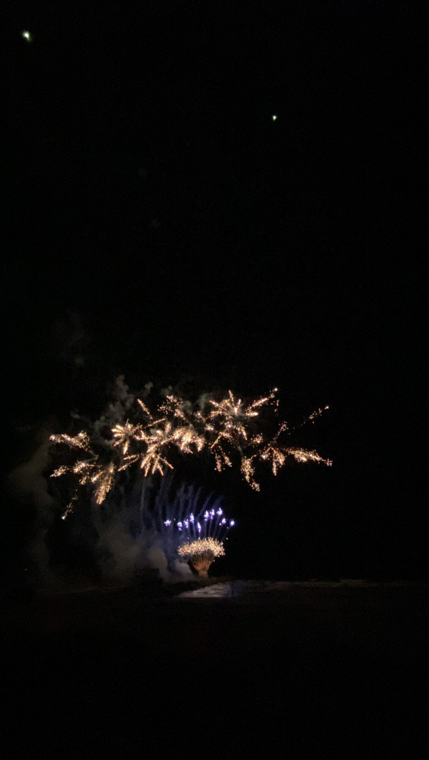 Fourth of July fireworks over historic Galveston Strand District waterfront